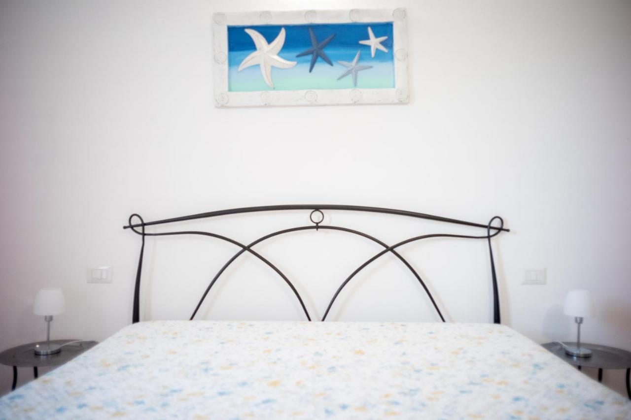 Dimora Mare Apartment San Teodoro  Bagian luar foto